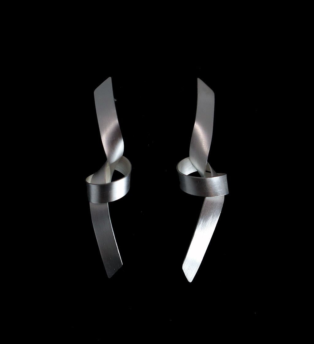 knot earrings, contemporary jewelry, long silver earrings, elegant earrings, modern jewellery, sleek earrings