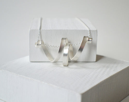 silver spiral necklace, curly necklace, contemporary jewelry, art jewellery, helix pendant