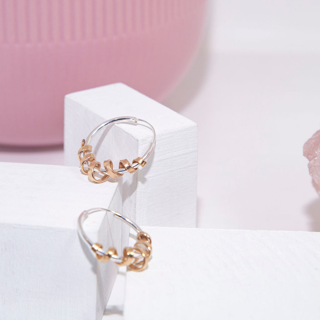 spiral hoops, hoop earrings, unique hoop earrings, contemporary hoops, versatile hoop earrings, 