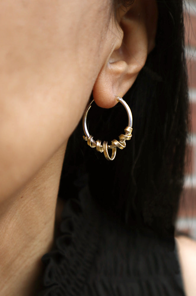 spiral hoops, hoop earrings, unique hoop earrings, contemporary hoops, versatile hoop earrings, 