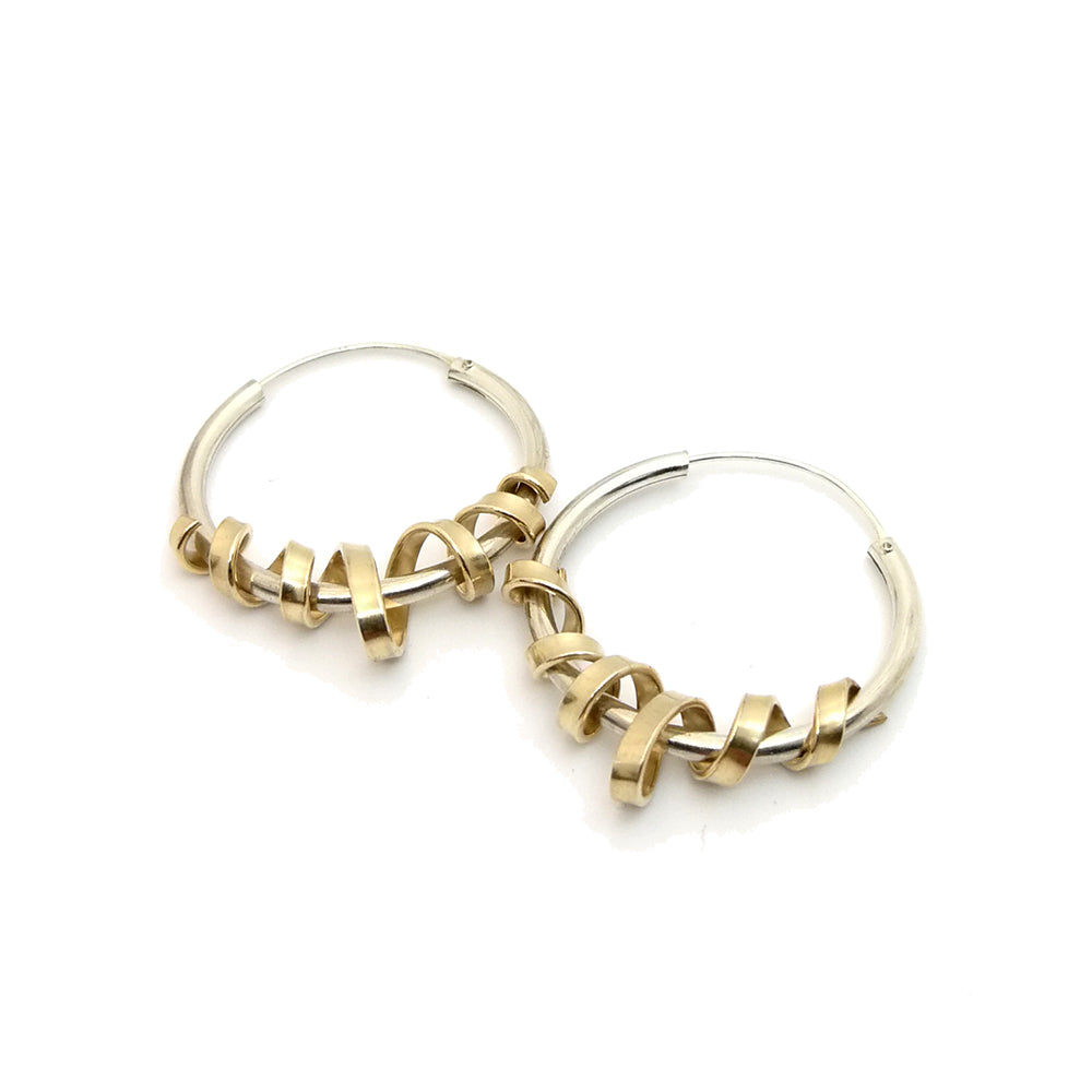 spiral hoops, hoop earrings, unique hoop earrings, contemporary hoops, versatile hoop earrings, 